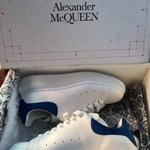 white and blue sneakers.